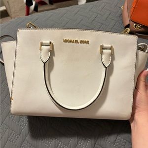 Used Michael Kors mid sized cross body or shoulder bag.